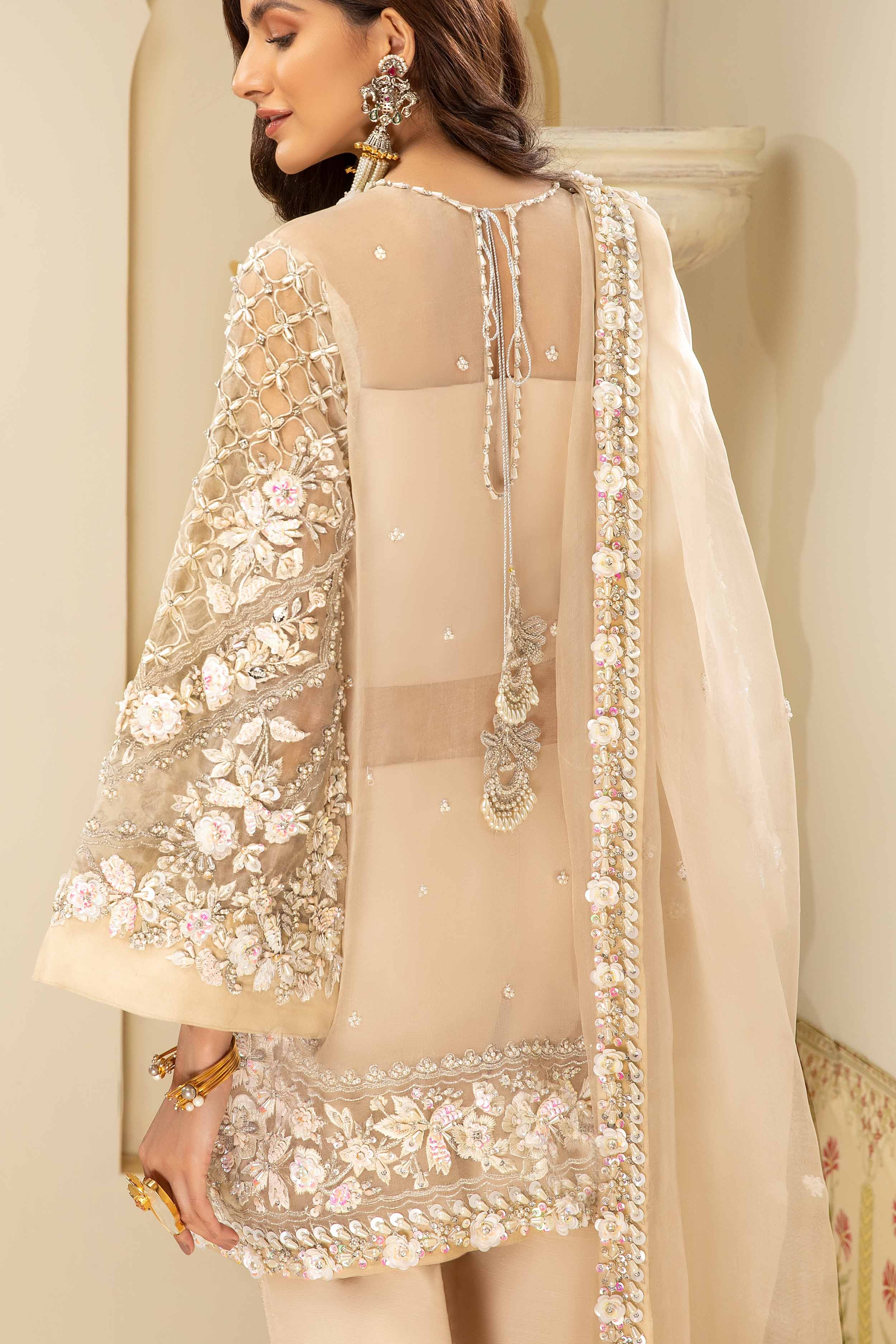 Ivory Luxe pakistani fashion outfit in ivory tones.